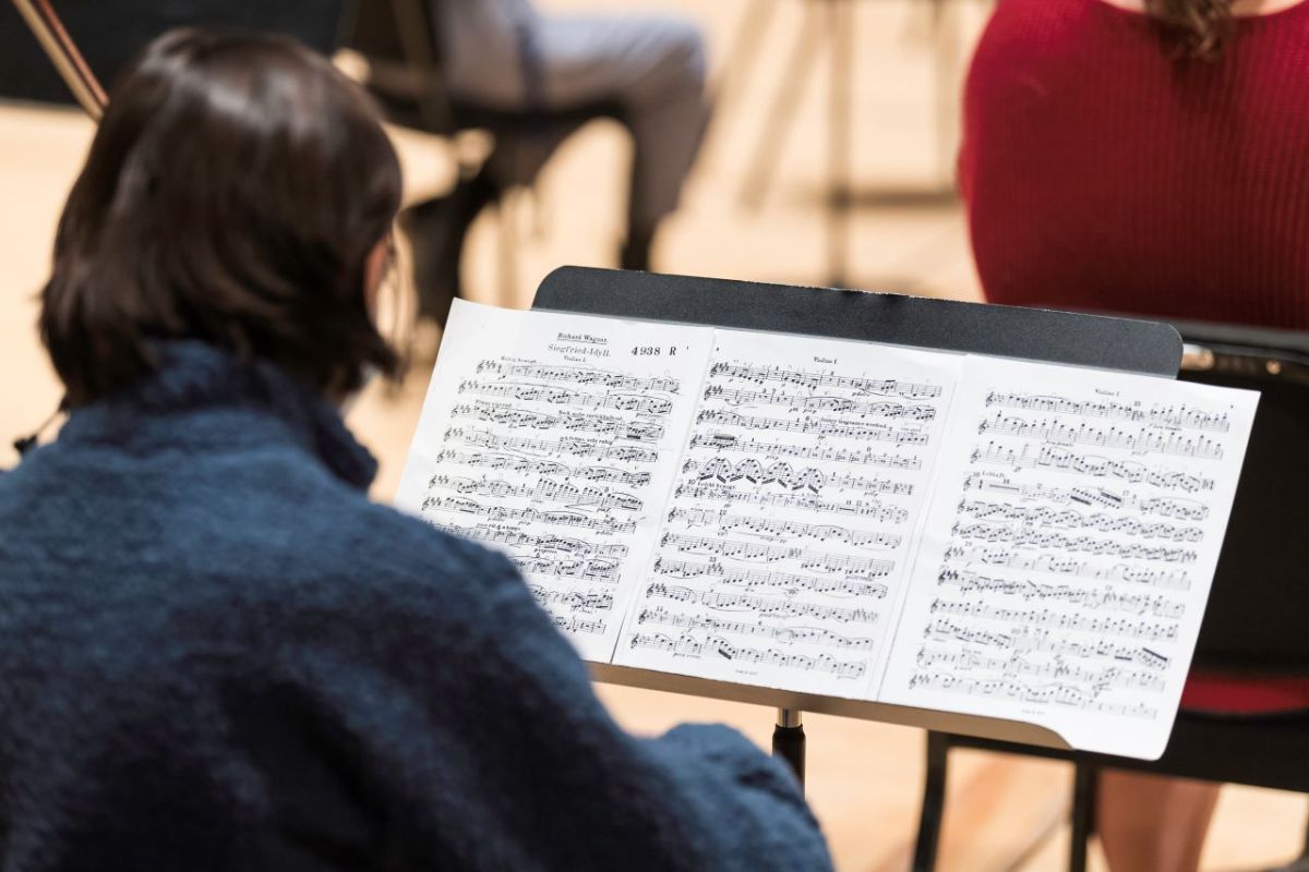 Professor of Conducting & Ensembles Neil Varon leads a rehearsal of the Eastman School Symphony Orchestra in Kodak Hall.